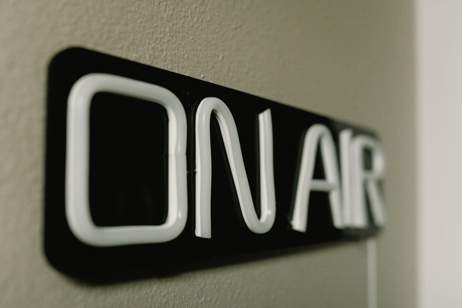 The ON AIR sign at the San Angelo Studios podcast studio